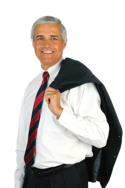 Усміхнений бізнесмен з піджаком над плечем — стокове фото