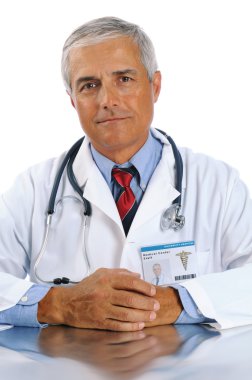 Doctor seated with hands together clipart