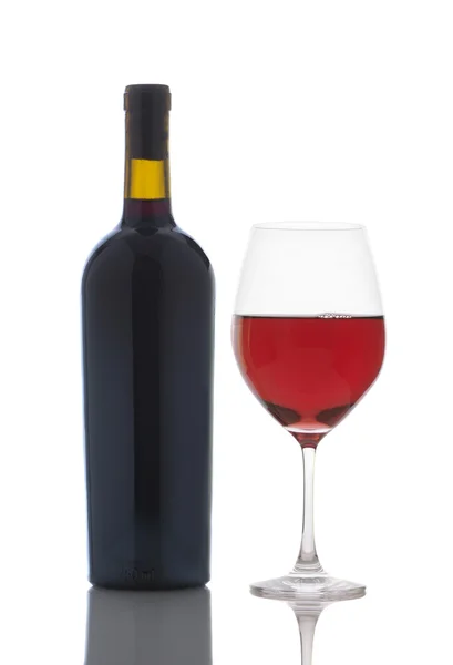 Ποτήρι κόκκινο κρασί και μπουκάλι — Φωτογραφία Αρχείου
