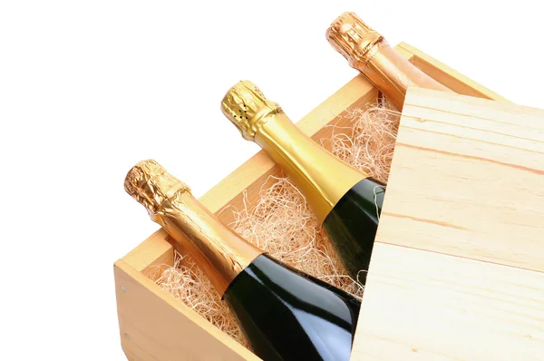 Champagne Flessen in houten krat — Stockfoto