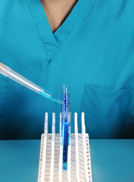 Lab Technician with Test Tubes and Pipette — Stock Photo, Image