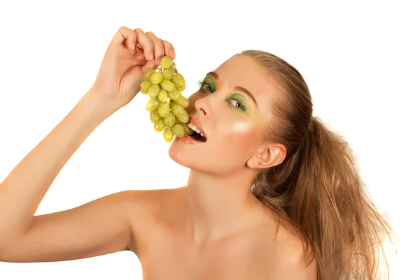 Girl with grapes — Stock Photo, Image