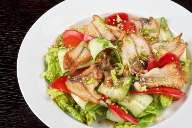 Salad of smoked eel clipart