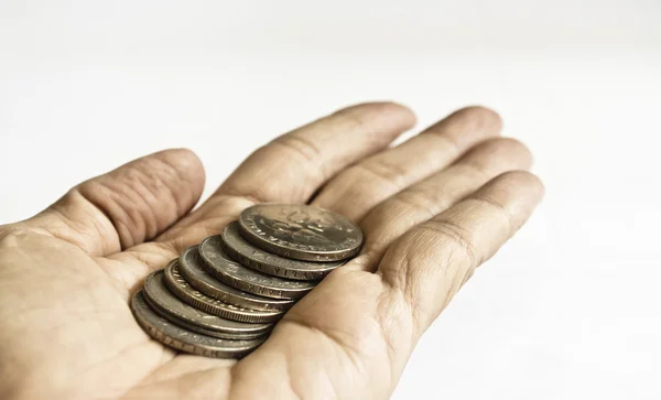 Sommige munten in de hand — Stockfoto