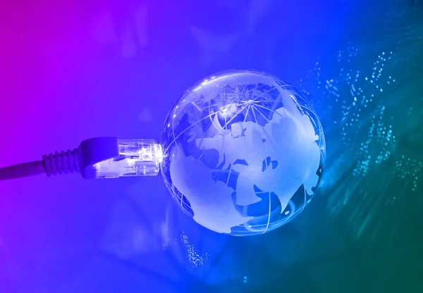Tecnologia globo terrestre contra fundo de fibra óptica — Fotografia de Stock
