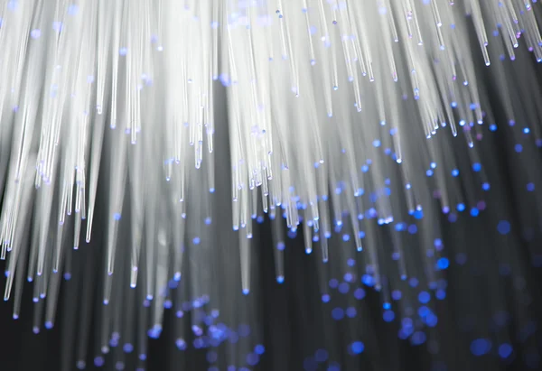 Glasfaser-Hintergrund mit vielen Lichtpunkten — Stockfoto
