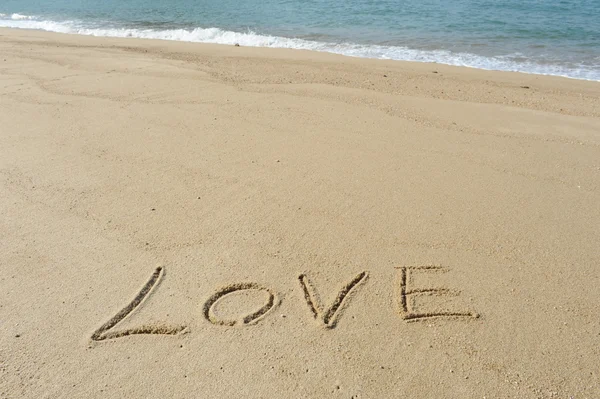 Love in the sand Stock Photo