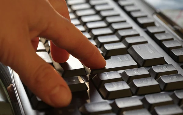 stock image Finger on keyboard