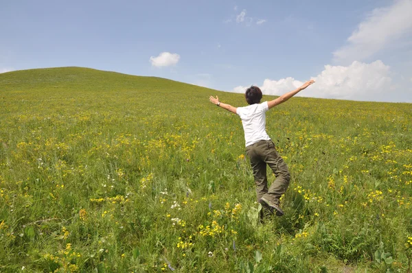 stock image Man on green meadow