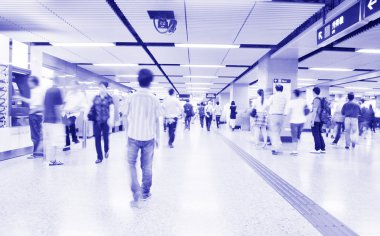 Passengers in the subway station in shanghai china. clipart