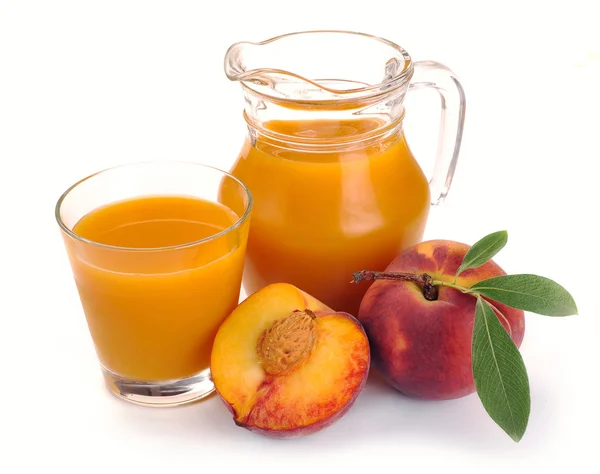 Pfirsichsaft und Früchte — Stockfoto