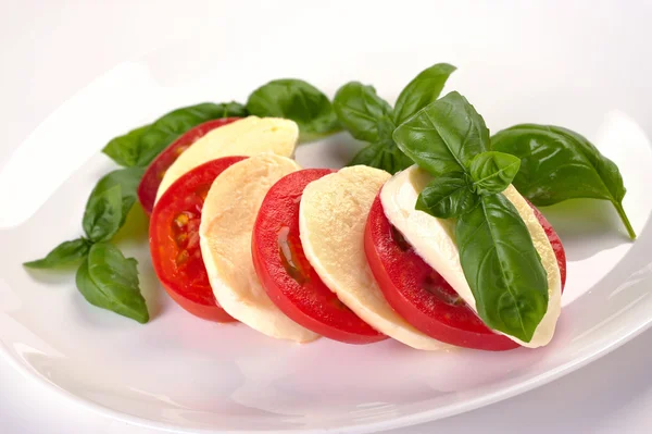 Mozzarella tomatoes basi — Stock Photo, Image