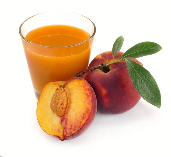 Persika juice och frukt — Stockfoto