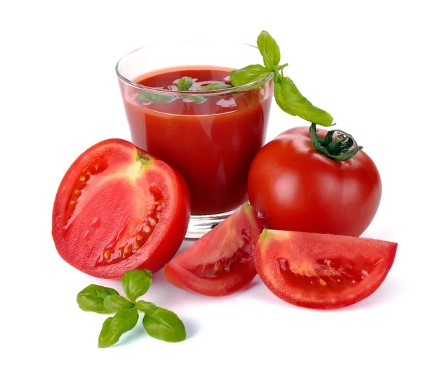 Sklenka rajčatové šťávy a ovoce — Stock fotografie