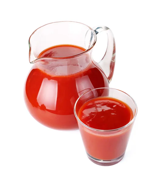 Jarro e copo de suco de tomate — Fotografia de Stock
