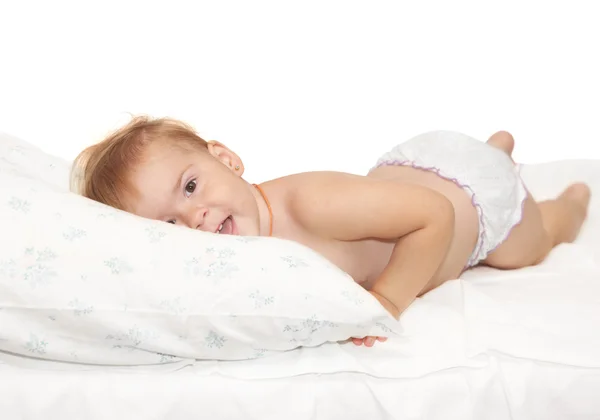 Дитина на ліжку — стокове фото