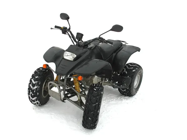 ATV Black All Terrain Vehículo sobre nieve blanca —  Fotos de Stock