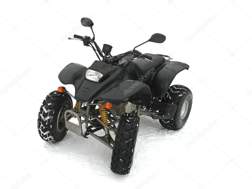 ATV Black All Terrain Vehicle on white snow