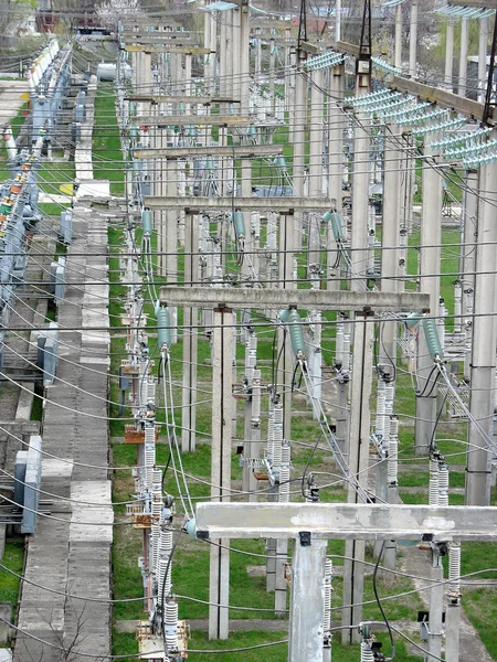 High voltage transmission power lines at power plant — Stock Photo, Image