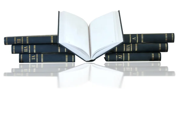 Pile of books, opened one isolated on white background — Stock Photo, Image