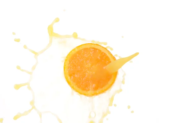 Апельсиновий сік зі сплеском — стокове фото
