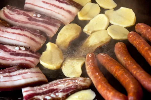 Grilled Bacon, sausages and potato — Stock Photo, Image