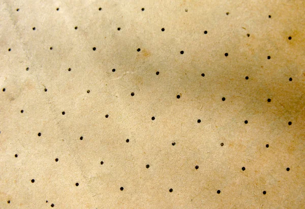 Tekstura starego papieru z kropkami. tło. makro — Zdjęcie stockowe