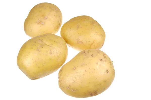 Кучка золотого картофеля, изолированного на белом — стоковое фото