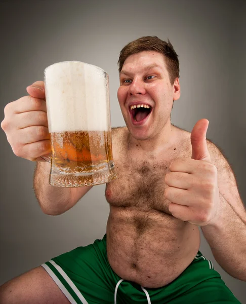 Funny fat man drinking beer — Stock Photo, Image