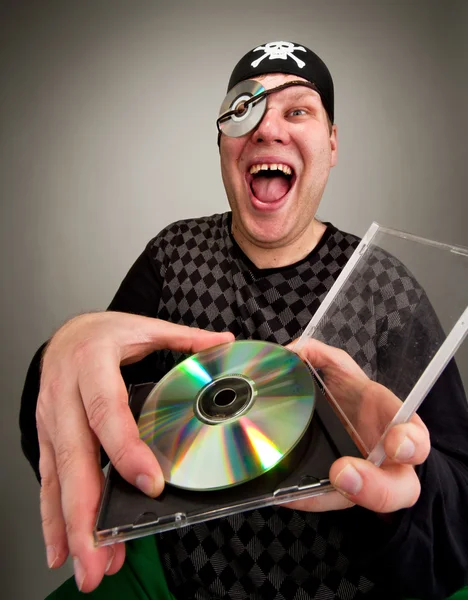Pirate with computer disk — Stock Photo, Image