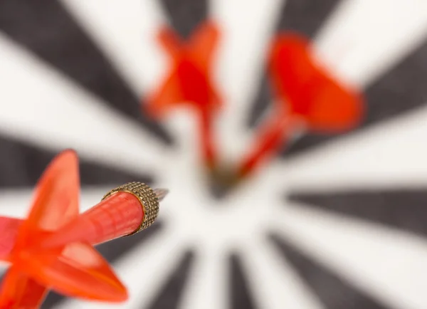 Red flying dart to dartboard — Stock Photo, Image