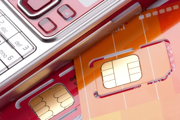 Mobiele telefoon met SIM-kaarten — Stockfoto