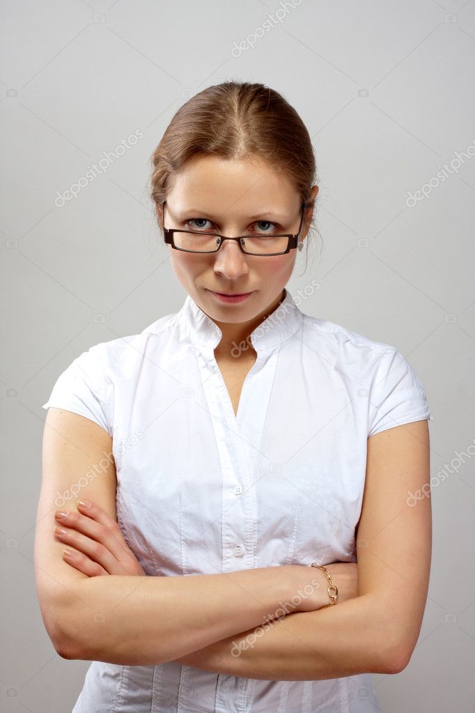 Portrait of business woman with crossed arms