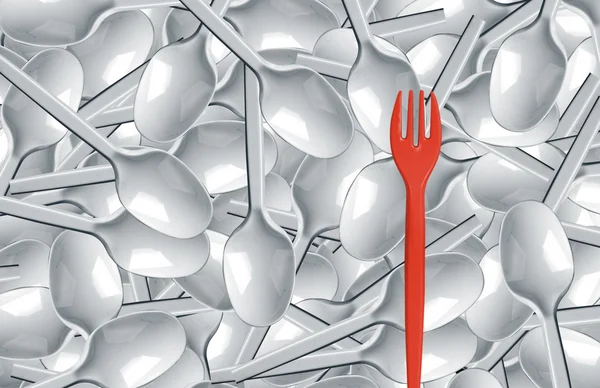 Cucchiai di plastica e forchetta rossa — Foto Stock