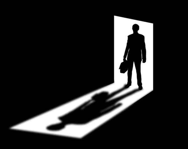 Silhouette of businessman in doorway — Stock Photo, Image