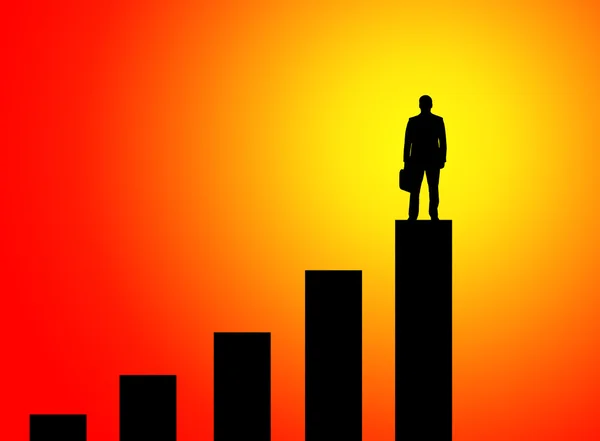 Podnikatel, stojící na vrcholu grafu — Stock fotografie