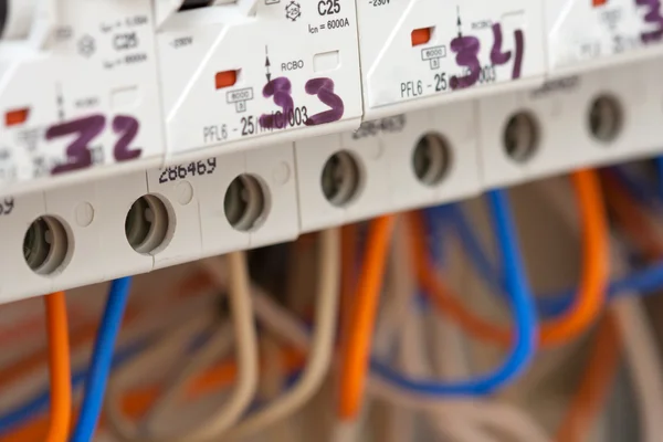 Electrical fuseboxes and power lines — Stock Photo, Image