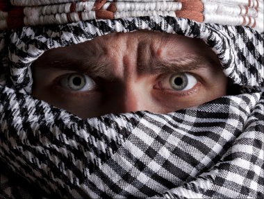Scared middle eastern man looking to you clipart