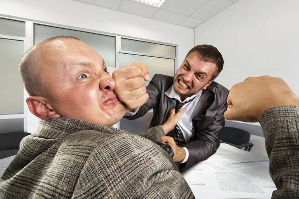 Businessmen fighting in the office — Stock Photo, Image