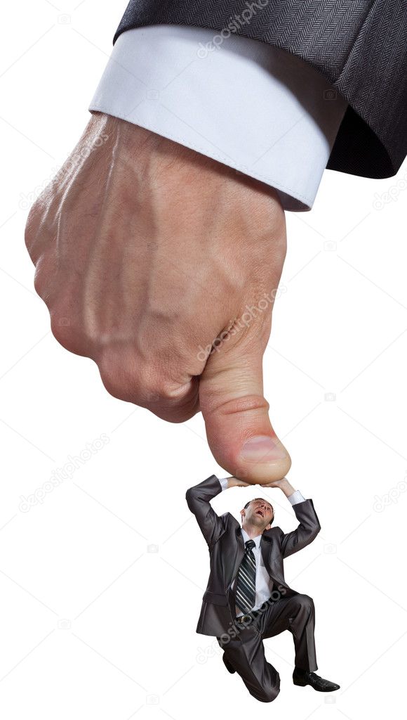 Big hand pushing businessman