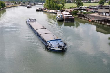 Barge near a lock clipart