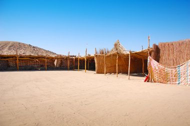 Bedouin village in the desert clipart