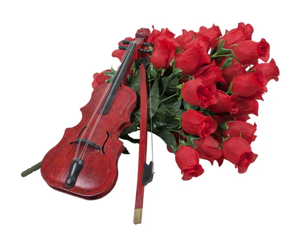 Violino em um buquê de rosas vermelhas — Fotografia de Stock