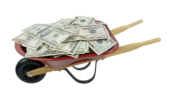 Rode kruiwagen vol geld — Stockfoto