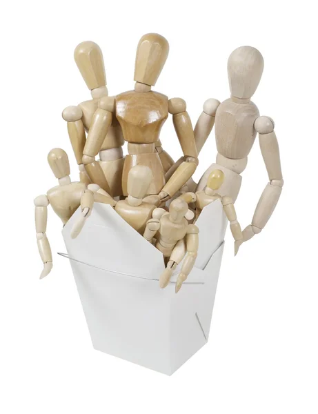 Menschliche hölzerne Kunstmodelle in einer Take-Out-Box — Stockfoto