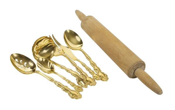 Goldware With a Rolling Pin — Stock Photo, Image
