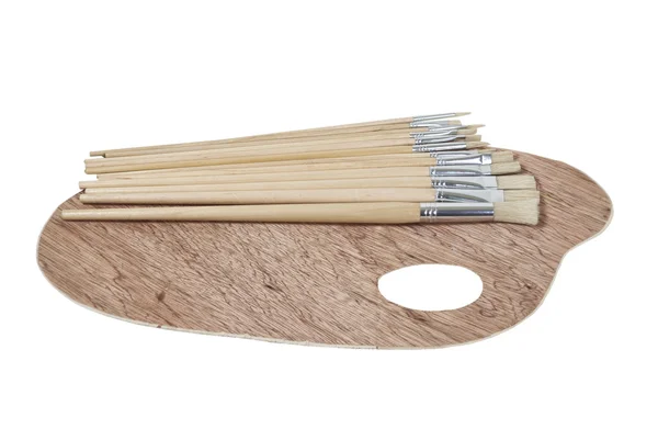 Wooden Palette and Paint Brushes — Stock Photo, Image
