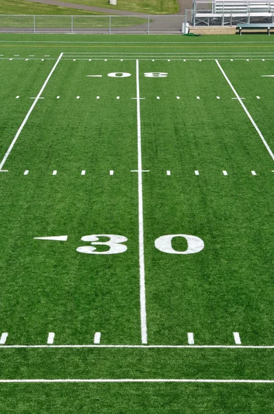 30 yards linjen på amerikansk fotbollsplan — Stockfoto