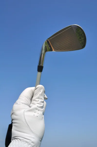 Golfspelare håller ett strykjärn (Golf Club) — Stockfoto