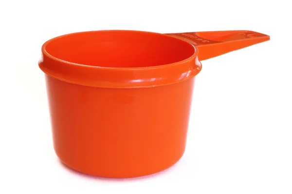 Oranje kunststof meten cup — Stockfoto